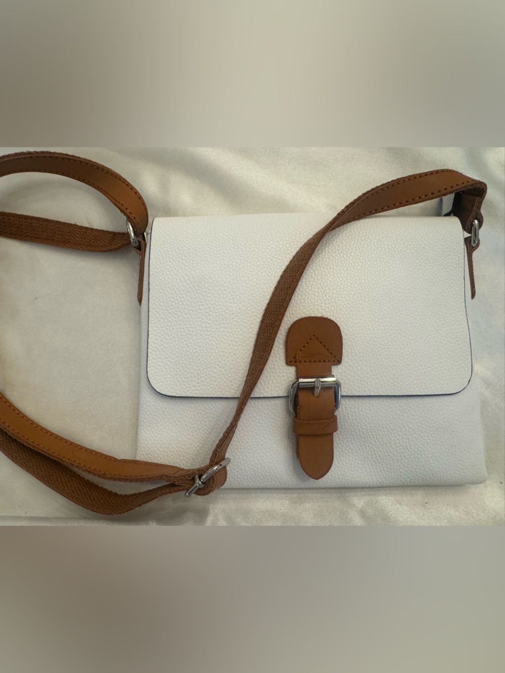 White Crossbody Bag with Tan Strap and Buckle